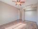 Bright bedroom features wood floors, closet and hall access at 1402 Bareback Ct, Henderson, NV 89014