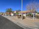 Charming home with a well-manicured front yard and tile roof at 1402 Bareback Ct, Henderson, NV 89014