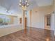 Inviting living room with wood floors, neutral paint, and ample natural light at 1402 Bareback Ct, Henderson, NV 89014
