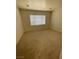 Spacious bedroom featuring neutral carpet and ample natural light from a window at 2341 Celestial Moon St, Henderson, NV 89044