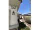 Close-up view of the house number and exterior wall with a decorative lantern at 2341 Celestial Moon St, Henderson, NV 89044