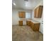 Spacious kitchen featuring ample cabinet space and a functional layout with tile flooring at 2341 Celestial Moon St, Henderson, NV 89044