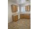 Bright kitchen with a corner sink, ample cabinetry, and modern appliances at 2341 Celestial Moon St, Henderson, NV 89044