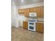 Functional kitchen featuring ample cabinet space and a double-oven gas range at 2341 Celestial Moon St, Henderson, NV 89044