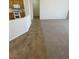 Living room view, carpet flooring transitions to tile flooring and the kitchen at 2341 Celestial Moon St, Henderson, NV 89044