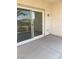 Covered patio with a sliding glass door looking out to desert landscaping at 2341 Celestial Moon St, Henderson, NV 89044