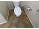 Close-up view of the toilet with tiled floor at 2341 Celestial Moon St, Henderson, NV 89044