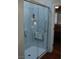 Walk-in shower with convenient grab bars and integrated seating for accessibility and comfort at 2601 Centaurus St, Henderson, NV 89044