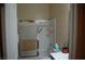 A bathroom with a shower/tub combination, toilet, and vanity sink at 2601 Centaurus St, Henderson, NV 89044