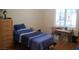 Bedroom with a bed, side table, and window with blinds at 2601 Centaurus St, Henderson, NV 89044