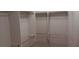 An empty closet with white shelving and bars ready for organization at 2601 Centaurus St, Henderson, NV 89044