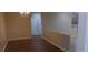 Bright dining area featuring hardwood floors, neutral walls, and traditional chandelier at 2601 Centaurus St, Henderson, NV 89044