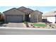 Charming single-story home with desert landscaping and a two-car garage at 2601 Centaurus St, Henderson, NV 89044