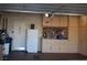 Well-organized garage with ample storage cabinets and workbench area, offering practical space at 2601 Centaurus St, Henderson, NV 89044