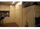 Garage with carpet offers extensive storage cabinets and workshop space at 2601 Centaurus St, Henderson, NV 89044