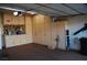 Spacious garage with built-in storage cabinets and organization system at 2601 Centaurus St, Henderson, NV 89044