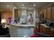 Well-lit kitchen features wood cabinets, light countertops, and a breakfast bar at 2601 Centaurus St, Henderson, NV 89044