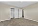 Comfortable bedroom featuring a large closet, plush carpeting, and ample natural light at 2716 Salt Lake St, North Las Vegas, NV 89030