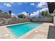 Backyard pool surrounded by privacy walls and desert landscaping, perfect for outdoor relaxation and fun at 2716 Salt Lake St, North Las Vegas, NV 89030
