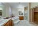Bathroom featuring a jacuzzi style tub and a glass enclosed shower at 283 Auster Park Ave, Las Vegas, NV 89148