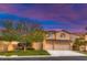 Charming two-story home with manicured lawn and three car garage at 283 Auster Park Ave, Las Vegas, NV 89148