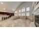 Inviting living room with fireplace and access to the kitchen at 283 Auster Park Ave, Las Vegas, NV 89148