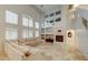 Bright living room features large windows, fireplace, and comfortable seating at 283 Auster Park Ave, Las Vegas, NV 89148