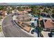 Aerial view of home with mature landscaping, three car garage and spacious driveway at 3181 Shadow Bluff Ave, Las Vegas, NV 89120