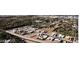 Aerial view of the residential development with new homes and ample green space at 3430 Cosima Ln, Las Vegas, NV 89120