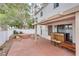 Spacious backyard with a covered patio provides an ideal setting for outdoor gatherings at 3491 Bankside Dr, Las Vegas, NV 89129