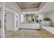 Beautiful bathroom with a soaking tub, walk in closet, and sinks, and tile floors at 360 E Desert Inn Rd # 604, Las Vegas, NV 89109