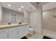 Bright bathroom with a walk-in shower, tile floors, and neutral color palette at 360 E Desert Inn Rd # 604, Las Vegas, NV 89109