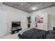 Bright bedroom with a walk-in closet, concrete ceiling, and neutral color palette at 360 E Desert Inn Rd # 604, Las Vegas, NV 89109