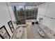 Stunning open concept with dining area, seating area and floor to ceiling windows with city views at 360 E Desert Inn Rd # 604, Las Vegas, NV 89109