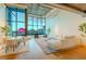 Bright living space featuring floor-to-ceiling windows and stylish modern furniture at 360 E Desert Inn Rd # 604, Las Vegas, NV 89109