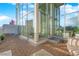 Spacious condo patio with floor-to-ceiling windows offering panoramic city views at 360 E Desert Inn Rd # 604, Las Vegas, NV 89109