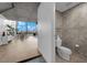 Stylish powder room with designer wallpaper and modern fixtures near bright living area with city views at 360 E Desert Inn Rd # 604, Las Vegas, NV 89109