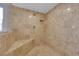 Tiled shower enclosure with built-in bench and niche, offering a spa-like experience at 360 E Desert Inn Rd # 604, Las Vegas, NV 89109