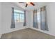 Bright bedroom featuring a window and ceiling fan, offering a comfortable and airy ambiance at 3741 Round Robin St, North Las Vegas, NV 89032