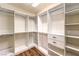 Large walk-in closet with custom shelving and ample storage space at 4045 Abernethy Forest Pl, Las Vegas, NV 89141