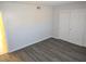 Bedroom features wood-look flooring and a double door closet at 4368 Vornsand Dr, Las Vegas, NV 89115