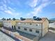 Rear view of apartment complex featuring desert landscaping and secure gated access at 4368 Vornsand Dr, Las Vegas, NV 89115