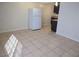 Open concept living room and kitchen area with tile flooring and lots of space at 4368 Vornsand Dr, Las Vegas, NV 89115