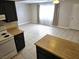 An open floorplan featuring a dining area with tile floors adjacent to the kitchen at 4368 Vornsand Dr, Las Vegas, NV 89115