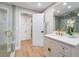 Elegant bathroom featuring a modern shower, white vanity, gold hardware, and stylish finishes at 616 Lacy Ln, Las Vegas, NV 89107