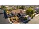 Charming single story home with a three car garage and desert landscaping at 6557 Secluded Ave, Las Vegas, NV 89110