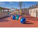 Engaging playground with colorful spheres and climbing structures for endless fun at 73 Lomita Heights Dr, Las Vegas, NV 89138