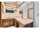 Bathroom featuring a vanity with lots of counter space and storage and a double mirror at 798 Shirley Ln, Boulder City, NV 89005