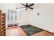Bedroom with terracotta flooring, a ceiling fan, a window seat, and neutral walls at 798 Shirley Ln, Boulder City, NV 89005