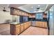 Spacious kitchen featuring granite countertops, ample cabinet space, and stainless steel appliances at 798 Shirley Ln, Boulder City, NV 89005